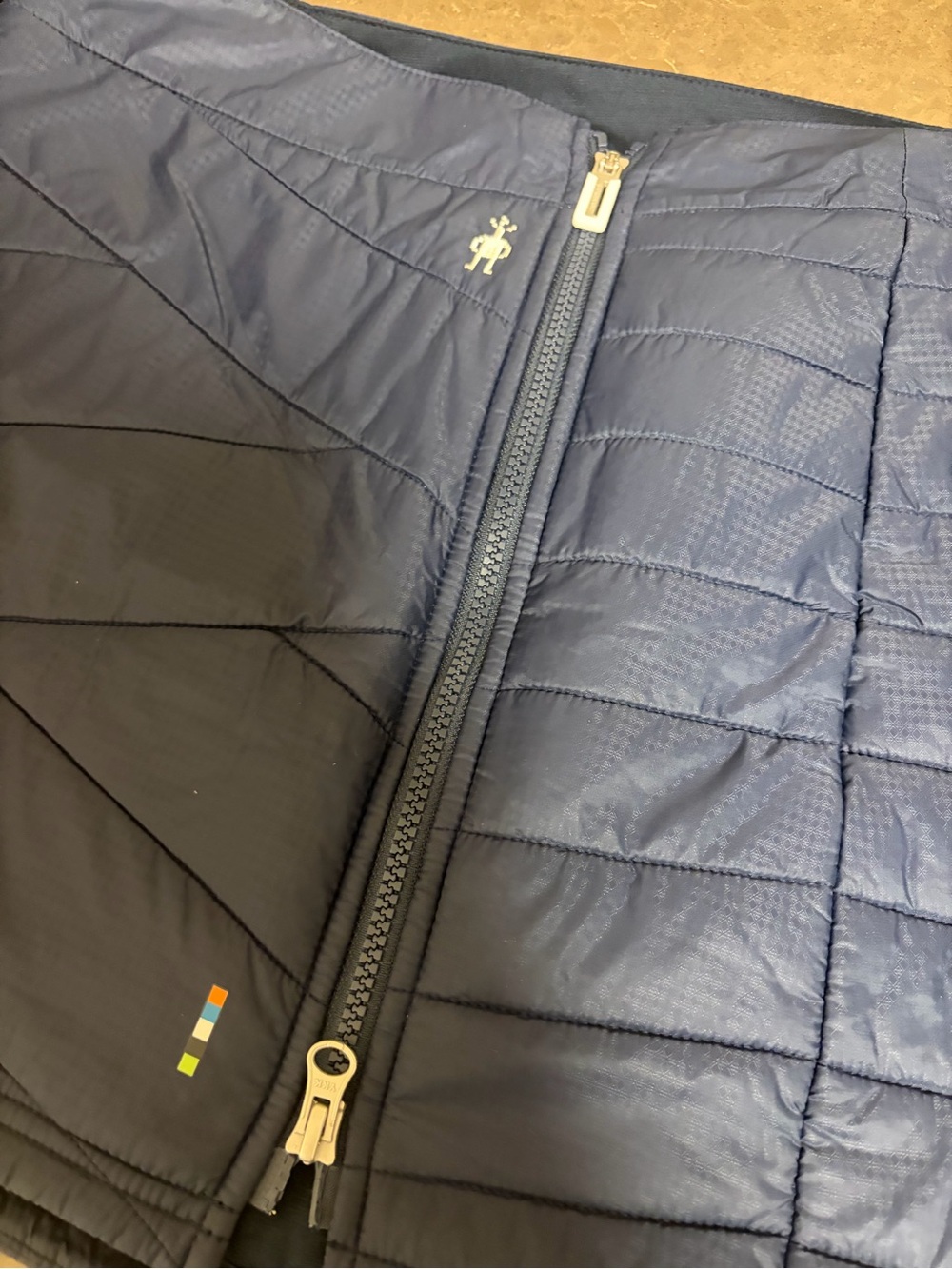 Smartwool Navy Quilted Packable skirt with Subtle Logo - Picture 2 of 4